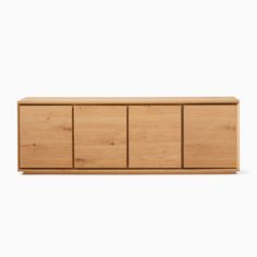 the sideboard is made out of wood and has four doors on one side, two drawers