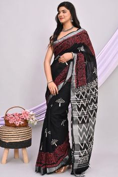 Discover timeless elegance with our Handblock Printed Linen by Cotton Saree, a masterpiece that blends tradition with modern sophistication. Crafted meticulously by skilled artisans, each saree tells a story of craftsmanship and heritage. Made from high-quality linen and cotton blend, this saree promises comfort along with a luxurious feel. The handblock printing technique used ensures that each motif is unique and exquisitely detailed, making it a wearable piece of art. Whether you wear it for Black Traditional Wear With Designer Patterns, Black Cotton Silk Pre-draped Saree With Cutdana, Black Chanderi Pre-draped Saree With Self Design, Block Print Traditional Wear For Diwali, Black Slub Silk Saree With Cutdana, Black Chanderi Traditional Wear With Block Print, Traditional Black Cotton Silk Pre-draped Saree, Black Slub Silk Saree Traditional Drape, Black Block Print Saree With Traditional Drape