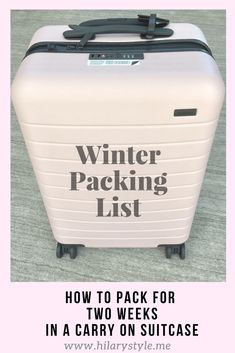 a white suitcase with the words winter packing list written on it in black and grey