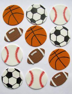 six decorated cookies with different sports balls on them, one is orange and the other is white