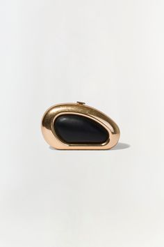 FALL 2024 WOMEN'S COLLECTION The Luna Clutch in Black Gold. Featuring a sleek gold frame and sophisticated black center, elevate your evening ensemble with this chic oval clutch. Elegant Structured Clutch For Formal Occasions, Elegant Structured Formal Clutch, Modern Gold Clutch For Party, Black Elegant Clutch For Formal Occasions, Elegant Black Clutch For Gala, Modern Gold Evening Bag For Formal Events, Elegant Black Clutch For Formal Occasions, Modern Structured Clutch For Formal Occasions, Modern Formal Evening Bag