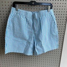 Seersuckers Shorts Reef Blue Strip Soft, Cotton-Blend Chambray Chinos With A Hint Of Stretch Full Elastic Waist Hip Pockets And Welt Pockets Faux Fly Approximate Inseam: Regular 10"; Petite 9" 98% Cotton/2% Spandex. Machine Wash. These Will Quickly Become Your Favorite Short. They Are So Classic, So Summer, And Oh-So-Comfy. The Welt Pockets Lie Flat And Smoothly. The Elastic Waist Takes The Pinch Out Of Wearing Shorts And Ensures You'll Have No Worries About Gapping. These Shorts Pair Perfectly Striped Cotton Swim Trunks For Spring, Spring Striped Cotton Swim Trunks, Spring Striped Swim Trunks With Short Length, Striped Swim Trunks For Spring, Spring Striped Short Swim Trunks, Blue Bermuda Shorts With Elastic Waistband For Summer, Blue Swim Trunks For Spring, Blue Knee-length Bermuda Shorts For Spring, Blue Bermuda Shorts For Spring With Short Inseam