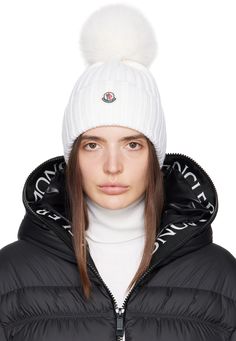 5 gauge rib knit modacrylic-blend beanie in white. · Faux-fur pom-pom appliqué at crown · Felted tricolor logo patch at rolled brim Supplier color: White Pom Pom Hat Outfit, Knitted Swimsuit, Hat Outfit, Snow Wear, Bodysuit Blouse, Cross Bag, Faux Fur Pom Pom, Pom Pom Hat, Pom Beanie