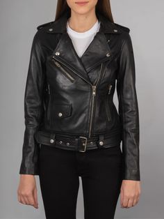 Introducing the ALmi Women Cool Leather Fall Short Motorcycle Jacket, a sleek and stylish outerwear option that combines edgy moto-inspired design with luxurious leather craftsmanship. This jacket is the perfect choice for those looking to add a touch of rebellion to their wardrobe while staying on-trend and fashionable. Crafted from high-quality leather, this motorcycle jacket boasts a supple and buttery texture that feels as luxurious as it looks. The rich black hue adds a timeless appeal, making it a versatile piece that can be effortlessly styled with a variety of outfits. The ALmi Women Cool Leather Fall Short Motorcycle Jacket features classic moto details, including an asymmetrical zip closure, zippered cuffs, and snap button lapels. These elements not only enhance the jacket's aest Fitted Moto Leather Jacket With Asymmetrical Zip, Edgy Leather Biker Jacket With Asymmetrical Zip, Edgy Fitted Leather Outerwear, Fitted Edgy Leather Outerwear, Edgy Leather Biker Jacket With Long Sleeves, Edgy Leather Biker Jacket, Edgy Long Sleeve Leather Biker Jacket, Edgy Leather Jacket With Asymmetrical Zip For Biker Events, Edgy Asymmetrical Zip Leather Jacket For Biker Events