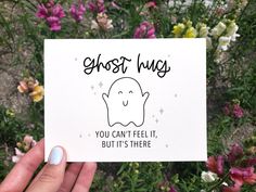 someone holding up a card that reads ghost way you can't feel it, but it's there