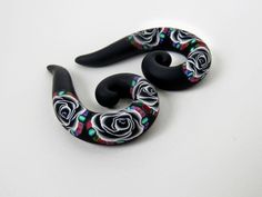 "Ear plugs/ 2g gauges/ 0g gauges/ 00g gauge/ 12mm gauge/ earring plugs/ handmade earplugs/ Rose earplugs/ black earplugs/ black rose earplugs/ ear gauges/ black ear gauges/ rose ear gauges/ earring gauges/ plugs for ear/ women's ear plugs/ sterling silver fake ear plugs. Beautiful 3D Black rose Earplugs a very unique design. Choose your style and size. ** FOR FAKE EAR PLUGS* the stud is 925 sterling silver. **Keep in mind all ear-plugs are made by hand, no molds or paint used, which means there Cheap Handmade Plug Earrings For Party, Unique Black Cartilage Earrings For Gift, Unique Handmade Black Plug Earrings, Handmade Black Piercings As Gift, 0g Gauges, 2g Gauges, Earring Gauges, Plug Earrings Gauges, Ear Gauges Plugs