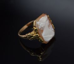 This is a 10K YG Cameo ring, Octagonal Shell cameo with decorations on sides, Circa 1930's, ring size 6, weight 3.5 grams, Nice vintge piece. Excellent condition. Stock #BB68R13 Olivia Ross, Cameo Ring, White Band, Boston Ma, Blue Topaz Ring, Topaz Ring, Pink Tourmaline, Blue Topaz, Gold Diamond