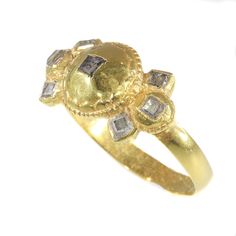 "Antique jewelry object group: ring Condition: very good condition Ring size Continental EU: 54 & 17¼ , Size USA: 6¾ , Size UK: N - Resizing is possible but because of the age of the ring we prefer to leave it untouched. We cannot guarantee to make it on every size; so please ask in advance. Return policy on this ring is not valid anymore once this work has been done. Do you wish for a 360o view of this unique jewel? The videoclip shows this treasure's full splendour as no picture can. Copy Antique Gold Ring With Rose Cut Diamonds, Ceremonial Gold Diamond Ring, Antique Gold Signet Ring With Rose Cut Diamonds, Antique Gold Cluster Ring, Antique Gold Cluster Ring With Rose Cut Diamonds, Ceremonial Yellow Gold Rings With Rose Cut Diamonds, Antique Gold Cluster Ring Hallmarked, Vintage Oval Rings With Historical Design, Antique Rings With Historical Design For Anniversary