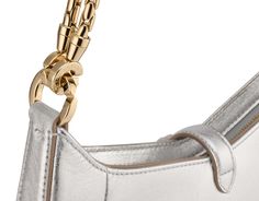 Serpenti Baia Small Shoulder Bag In Silver Striated Calf Leather With Foggy Opal Grey Nappa Leather Lining. Captivating Snakehead Magnetic Closure In Light Gold-plated Brass Embellished With Brushed Grey Enamel And Light Gold-plated Brass Scales And Black Onyx Eyes; Additional Zipped Top Closure. Modern Evening Shoulder Bag With Horsebit Detail, Elegant Shoulder Bag With Horsebit Detail, Luxury Silver Shoulder Bag With Palladium Hardware, Luxury Gold Bag With Palladium Hardware, Evening Rectangular Shoulder Bag With Horsebit Detail, Silver Luxury Clutch Shoulder Bag, Luxury Silver Clutch Shoulder Bag, Gold Shoulder Bag With Palladium Hardware For Evening, High-end Silver Leather Shoulder Bag