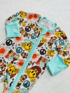 Provide your baby or toddler with the ultimate comfort with the softest sleeper pajamas and daywear they'll ever own! Crafted from buttery soft bamboo, our sleepers and daywear are designed to be gentle on your little one's sensitive skin and stretchy enough to accommodate growth for extended wear. Parents will love the convenience of our double zippers, making diaper changes a breeze. BambooBabies sleepers also include fold-over mittens to protect against sharp fingernails and fold-over foot cu Long Sleeve Onesie With Cartoon Print For Bedtime, Cartoon Print Long Sleeve Onesie For Bedtime, Playful Cartoon Print Onesie For Sleepovers, Cute Cartoon Print Onesie For Sleep, Cute Cartoon Print Sleep Onesie, Super Soft Long Sleeve Onesie For Bedtime, Long Sleeve Super Soft Onesie For Bedtime, Long Sleeve Onesie For Bedtime, Playful Cartoon Print Onesie For Bedtime