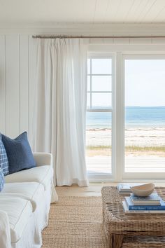 the living room is clean and ready to be used as a beachfront home office