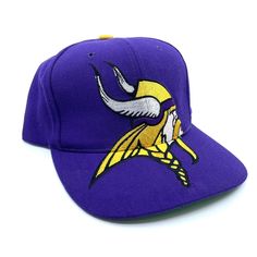 Vintage 90s- Minnesota Vikings Big Face Logo Wool Snapback Hat • Pristine • RARE. Very rare hat! You’re not gonna come across this hat very easily. Pristine/Flawless condition! Mint condition and shows Little to know wear. This could probably pass as new. Freshly washed & cleaned, ready to wear. Give me your best offer. Vintage Blue Snapback Hat With Flat Bill, Minnesota Vikings Helmet, Minnesota Vikings Blanket, Minnesota Vikings Hat, Throwback Team-colored Snapback Hat, Face Logo, Big Face, Minnesota Vikings, Snapback Hat