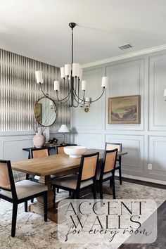 a dining room table with chairs and a chandelier