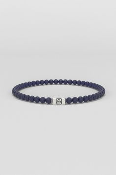 Experience the perfect fusion of style and substance with our Men's Essential Silver Bracelet 6mm. This exquisite piece is handcrafted with precision and features a mesmerizing blend of natural gemstones, each selected for its unique properties and energy. The captivating Amethyst provides grounding and protection, while Howlite promotes emotional balance and tranquility. Jasper symbolizes stability and grounding, and Lapis Lazuli enhances communication and self-awareness. Turquoise is believed to have healing properties, and Lava stone is associated with grounding and connection to the earth. Finally, the Tiger Eye brings good luck, prosperity, and balance. The gemstones are meticulously faceted to enhance their natural beauty and separated by sleek and minimalistic 925 Silver spacers, ad Modern Gemstone Beads Bracelets, Red Tigers Eye, Emotional Balance, Ring Pendant Necklace, Pearl Gemstone, Mens Essentials, Lava Stone, Healing Properties, Modern Man