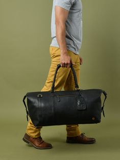 Black leather duffel bag men |  Leather travel bag | Leather weekender bag | Personalized gifts for him | Christmas Gift For Husband | CYBER2024 GUARANTEED CHRISTMAS DELIVERY ON ORDERS PLACED BEFORE THE 19TH OF DEC. The leather weekend duffle bag for men makes for an extra special travel gift for your partner. Handmade from genuine full-grain leather, reliable YKK zippers and durable brass fitting our travel bag is stylish and durable. Designed to pack comfortably for 4 days the bag fits comfort Duffle Bag For Men, Leather Duffle Bag Men, Christmas Gift For Husband, Weekend Duffle Bag, Leather Holdall, Leather Anniversary Gift, Leather Duffel Bag, Leather Weekender Bag, Leather Duffel