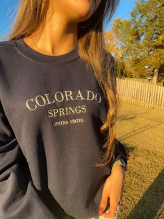 Take a little vacation to Colorado Springs with this crewneck sweatshirt. This sweatshirt features long sleeves, a crew neckline, and beautiful front embroidery. The Unisex Sizing makes the sweatshirt run slightly larger than your average sweatshirt for women. Most men find their normal size to be more snug. If you want a slightly looser fit, size up one size. Please check out our size chart for measurements to ensure an accurate fit. PLEASE BE SURE TO INPUT YOUR CORRECT SIZE/COLOR + SHIPPING AD Crewneck Sweatshirt Women, Everyday Fashion Outfits, Sweatshirt For Women, Embroidered Crewneck, Colorado Springs, Comfy Outfits, Crew Neckline, Everyday Fashion, Shoes Jewelry