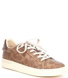 From COACH&#x2C; the Lowline C Logo Print Canvas Sneakers feature:C logo print coated canvas upperLace-up closureFine mesh liningRubber outsoleFlat heelImported. Coach Sneakers, C Logo, Print Coat, Coach Shoes, Canvas Sneakers, Dillard's, Golden Goose Sneaker, Casual Sneakers, Logo Print