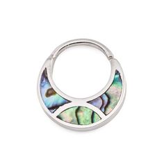 a silver ring with abana shell inlays on the outside, and an open circle