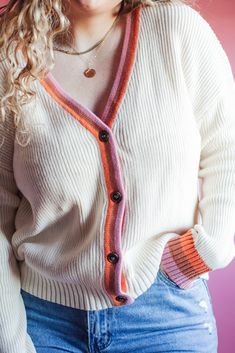 This cardigan is so beautiful! It is such good quality and so elevated with it's details. It features color block stripes on the cuffs and down the front with four working buttons down the front. It's so soft and would be perfect with your favorite pair of jeans, over a dress and it will transition so well into the warmer months. Model is wearing a size Large Clear Sky, Striped Cardigan, A Dress, So Beautiful, Good Quality, Color Block, Stripes, Adidas, How To Wear