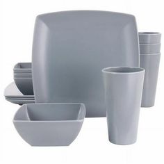 a set of gray dishes and cups on a white background