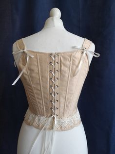 This silk corset is made after original 18th century paterns and has a strong waist reduction effect. It makes a specific Rococo shape with prominent bust and small waist, most feminine and fashionable acording to the Madame de Pompadour epoch standarts. It can be worn for the 17th - 18th century ball as a proper undergarnment of the epoch, being a part of the full costume, or become a bodice for the Renaissance, Baroque or Rococo inspired fantasy outfit. The corset on listing pictures is made o Elegant Corset Dress With Boning For Costume, Historical Underbust Corset Dress For Wedding, Wedding Underbust Corset Dress With Historical Design, Victorian Costume Corset, Boned Bodice For Costumes, Elegant Corset Dress With Historical Design, Regency Style Corset Dress With Boned Bodice, Victorian Overbust Wedding Corset, Victorian White Underbust Corset