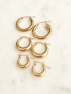 Chunky hoop earrings gold Thick Gold Hoop earrings Non tarnish gold earrings stainless steel Bold Statement Jewelry Dainty Minimalist Welcome to our store! We're so thrilled to have you here!  This minimalist gold earrings is perfect for daily wear, made with a thick plating of 18k Gold to ensure that your earrings stay shiny and are hypoallergenic.  ♥  J E W E L R Y ∙ D E T A I L  - Material: high quality 18k gold plated over stainless steel - 3 Size available: S (15mm), M( 20mm),L ( 24mm)  - P Funky Gold Earrings, Everyday Minimalist Gold-tone Huggie Earrings, Everyday Stainless Steel Single Huggie Earring, Minimalist Gold-tone Hoop Earrings For Everyday, Tarnish Resistant Small Hoop Huggie Earrings In Stainless Steel, Everyday Stainless Steel Hoop Huggie Earrings, Tarnish Resistant Stainless Steel Small Hoop Huggie Earrings, Gold-tone Hypoallergenic Hoop Earrings For Everyday, Minimalist Metal Hoop Earrings Tarnish Resistant