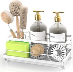 three soaps, toothbrushes and other bathroom items in a holder