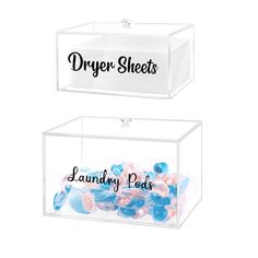 two clear boxes filled with blue and pink candy