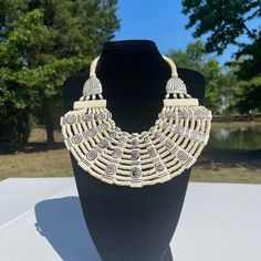 Check Our Lives Handmade Choker Jewelry, Adjustable Cream Jewelry For Parties, Elegant White Jewelry For Festival, Adjustable Cream Necklace For Party, Adjustable White Metal Beaded Necklace, Handmade White Metal Beaded Necklaces, Handmade White Beaded Metal Necklace, Bohemian Cream Jewelry For Party, Cream Bohemian Jewelry For Party