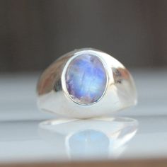 Rainbow Moonstone 925 Sterling Silver Ring, Oval Cab Blue Moonstone Gemstone 18K Rose Gold, 18K Yellow Gold Jewelry, Artisan Gift Jewelry Gemstone : Rainbow moonstone Stone Size : 10 x 12 mm Ring Size : Please Choose Your Size stone Color : Blue Material : Sterling silver It's a unique gift for anyone zodiac style ring . Please Notice before checkout :- Due to we use natural stones, the stones may vary slightly in shape, size and color. Contact us for any other gemstone customization before chec Celestial Style Hallmarked Oval Jewelry, Celestial Hallmarked Jewelry With Oval Stones, Celestial Oval Opal Birthstone Ring, Celestial Opal Birthstone Ring In Oval Shape, Celestial Oval Cabochon Rings, Blue Moonstone Ring With Natural Stones, Oval Cabochon Moonstone Ring In Fine Jewelry Style, Celestial Oval Cabochon Gemstone Rings, Celestial Style Oval Cabochon Gemstone Ring