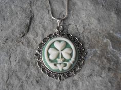 "For sale are beautiful flawless Irish Claddagh Shamrock cameo necklace, stunningly detailed, I have several other styles and colors, so please do browse. They are offered at a reasonable price, make perfect gifts, and are wonderful quality The cameo is set in a pretty silver plated setting, and the chain is 22\" .925 silver plated 1.2mm snake chain, with a lobster claw clasp I make several varieties, colors, styles and matching sets I will be glad to do special requests, if you don't see it I c Cameo Pendant Necklace, Irish Claddagh, Irish Jewelry, Clover Green, Mermaid Necklace, Cameo Necklace, Cameo Pendant, Stunning Necklace, Leaf Clover