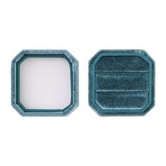 an empty blue and white plate with a small square in the middle on a white background