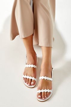 Elegant White Slingback Sandals For Beach, White Toe Loop Sandals For Beach, White Slingback Sandals For Beach With Single Toe Strap, White Slingback Sandals With Single Toe Strap For Beach, White Slingback Sandals For Beach, Adjustable White Barefoot Sandals, White Leather Toe Ring Sandals For Beach, White Sandals Flat, Bridal Flat Sandals