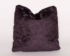 This listing is for one handcrafted square boudoir pillow, in Highland Court's exquisitely regal cut velvet in the deep eggplant colorway.  This pillow is 11" square Pillows are designed with a knife edge, and each features tapered corners which allow for complete fullness and eliminate the floppy dog-eared corners of mass-produced pillows.  Pillows feature invisible zippers that are reinforced, along with overcast, double-stitched seams throughout. Pillow measurements are approximate, and run from seam center to seam center, both horizontally and vertically, as opposed to corner to corner. Our designs are lit to accurately reflect color in photographs to the best of our ability; if you are not certain your device accurately depicts color, we will happily reshoot and email a photo so that Pillow Measurements, Purple Throw Pillows, Square Pillows, Chill Room, In The Deep, Down Feather, Wardrobe Style, Velvet Pillows, Queen Size Bedding