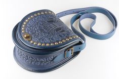 "Blue bag with metal, round leather bag, embossed bag, blue leather purse, crossbody bag, tooled blue bag, gift for her, shoulder purse Model \"Guelder rose\"+metal Unique handmade bag made of premium 4 mm genuine calf leather. Made using rare technology of hot tooling. Ornamented with grape vines and cluster of grapes images, decorated with metal. Super comfortable, durable and functional. Has one big compartment, one internal zip-pocket and one button pocket, e.g. for cell phone or keys. Dimen Blue Hand-tooled Bag For Everyday Use, Blue Hand Tooled Bag For Everyday Use, Hand Tooled Blue Crossbody Bag, Blue Hand Tooled Leather Shoulder Bag, Blue Leather Hand Tooled Shoulder Bag, Hand-tooled Blue Crossbody Shoulder Bag, Hand Tooled Blue Leather Shoulder Bag, Grapes Images, Guelder Rose