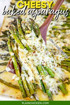 asparagus with parmesan cheese on top in a casserole dish