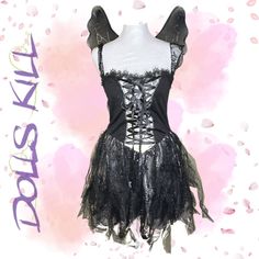 This Sexy Goth Fairy Costume Has A Stretchy Metallic Lining, A Front Lace Up Design, Lace Shoulder Straps, And A Tulle Skirt With A Floral Lace Overlay. Includes Glitter Fairy Wings With Elastic Arm Bands. Materials: 98% Polyester 2% Spandex Care: Machine Washable, Air Dry Black Fairy Aesthetic Costume, Fairy Kei Sleeveless Party Fairy Dress, Fairy Kei Sleeveless Party Dress, Fitted Fairy Kei Dress For Party, Fitted Fantasy Fairy Dress For Party, Fairy Grunge Fitted Dress For Party, Fairy Kei Fitted Mini Dress For Party, Fitted Fairy Kei Mini Dress For Party, Fitted Fairy Dress For Halloween Party