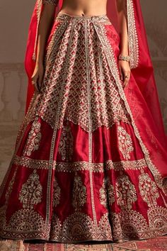 Red can can attached lehenga featuring zardozi embroidered tree, persian floral jaal motifs highlighted by sequins and pearls. Comes with matching embroidered padded blouse and dupatta. - Aza Fashions Wedding Choli With Zari Work And V-neck, Festive V-neck Lehenga With Dupatta, V-neck Wedding Dress For Diwali, Traditional V-neck Wedding Sets, Festive V-neck Lehenga With Resham Embroidery, V-neck Wedding Dress With Dupatta, Diwali V-neck Lehenga With Resham Embroidery, Festive V-neck Lehenga With Zari Work, Red V-neck Sets For Navratri