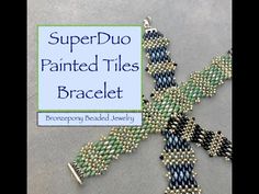 the beaded bracelet has been made with blue and green seed beads, which are attached to