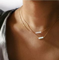 "Selenite Minimalist Crystal Necklace 14K Gold Plated Waterproof | Anti Tarnish | Made to order * Materials: 14K Gold Plated High Quality Stainless Steel or Silver Plated * Gemstone: GENUINE Selenite Crystal Pendant * Closure: Lobster clasp * Style: Minimalist * Chain Length Options: 14\", 16\", 18\" (Custom Lengths No Extra charge) Selenite Selenite is often used to remove energy blocks, stuck or stagnant energies from the etheric body. Its high vibrations cleanse the aura and activate the high Selenite Crystal Jewelry, Selenite Jewelry, Selenite Necklace, Etheric Body, Minimalist Chain, High Vibrations, Energy Blocks, Selenite Crystal, Crystal Necklaces