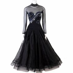 a black and silver dress with sequins on it