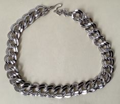 "Monet silver plated link chain necklace  Adjustable - 19\" - 20.5\" with hook clasp  Hook marked: copyright symbol Monet  Very good to excellent condition  07/18/23 1342" Trendy Silver Curb Chain Necklace, Trendy Silver Necklace With Curb Chain, Silver Metal Necklace With Curb Chain, Metal Curb Chain Necklace, Formal Metal Chain Necklace, Silver Double Chain Link Necklace, Trendy Silver Cuban Link Necklace, Trendy Silver Cuban Link Necklaces, White Gold Curb Chain Necklace