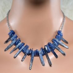 LP 1356 Kyanite Slices And Kyanite Spikes by laurapaulinejewelry Modern Necklaces With Natural Stones For Jewelry Making, Blue Kyanite Gemstone Beads Jewelry, Blue Kyanite Jewelry With Gemstone Beads, Blue Kyanite Gemstone Necklace, Handmade Sapphire Kyanite Necklace, Handmade Sapphire Necklace In Kyanite, Blue Oval Faceted Necklaces, Blue Oval Faceted Necklace, Modern Blue Oval Necklace