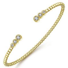 Gabriel Bujukan 14K Yellow Gold Six Graduating Bezel Diamond Bangle Bracelet Set with 0.25 Carat Total Weight Round Diamonds and Milgrain Detailing Diamonds are SI clarity and G/H color- 6 diamonds in bracelet Bracelet measures approximately 1/16th inch wide Includes bracelet box Includes jewelry appraisal Free expedited shipping on this item Ships fully insured to point of delivery Luxury Bangle Bracelets With Bezel Setting, Bezel Set Diamond Bangle Bracelet, Yellow Gold Jewelry Bangle With Bezel Setting, Gold Bezel Set Bangle Tennis Bracelet, Gold Tennis Bracelet With Bezel Setting, Yellow Gold Bangle Diamond Bracelet With Bezel Setting, Yellow Gold Diamond Bangle With Bezel Setting, Yellow Gold Diamond Bangle Bracelet With Bezel Setting, Fine Jewelry Bezel-set Bangle