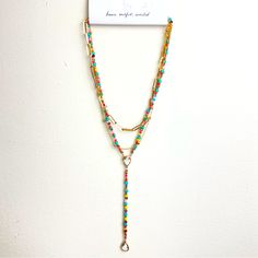 Never Worn! Multicolor Beaded Clavicle Necklace As Gift, Trendy Adjustable Lariat Layered Necklace, Summer Multicolor Clavicle Chain Jewelry, Adjustable Multicolor Beaded Chain Necklace, Trendy Gold Beaded Necklaces With Lobster Clasp, Trendy Gold Beaded Necklace With Lobster Clasp, Trendy Red Beaded Necklace For Party, Multicolor Clavicle Chain Necklace For Party, Trendy Colorful Necklace With Adjustable Chain