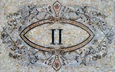 the letter i is made up of mosaic tiles and has an ornate design on it