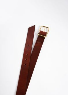 Please consider ordering our Tape Measure before placing the order for your belt. It is the best way to insure proper sizing. While it does delay the arrival of your belt, it prevents future frustration due to sizing issues. The purchase price will be credited towards your future belt purchase. We've spent years designing our proprietary buckle, perfecting the fit, and sourcing the highest quality leather and hardware from U.S. based companies for our Signature Belt. Practical and timeless, each Leather Belt Buckles With Brass Buckle For Work, Formal Leather Belt With Brass Buckle, Formal Bridle Leather Belt With Brass Buckle, Luxury Brown Belt With Brass Buckle, Brown Belt With Brass Buckle For Work, Brown Workwear Belt With Brass Buckle, Formal Brown Belt With Brass Buckle, Formal Brown Belts And Suspenders With Brass Buckle, Brown Belt Buckles For Workwear