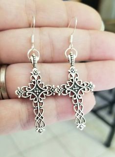 New  Handmade  Silver Celtic Cross Earrings  ♡ Intricate filigree Cross Dangle Earrings  ♡ Measure 2.25 inches long  ♡ Ear hooks stamped .925 Sterling silver  ♡ Stainless steel cross charms ♡ Lightweight ♡ Ships within 24 hours of purchase Monday-Saturday ☆ Matching Necklace available in my etsy store Gift Packaging & Messages: Your item will be lovingly packaged and labeled as a handmade item.  Item's that ship with gift boxes are stated in the description. Handwritten gift notes available, jus Elegant Pierced Cross Earrings, Intricate Design Dangle Plug Earrings As Gift, Intricate Design Dangle Plug Earrings For Gift, Intricate Dangle Plug Earrings As Gift, Adjustable Filigree Dangle Earrings, Dangle Plug Earrings With Intricate Design As Gift, Dangle Plug Earrings With Intricate Design For Gifts, Silver Cross Earrings, Handwritten Gifts