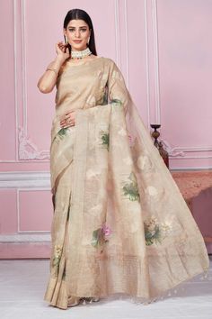 Buy stunning beige floral print Banarasi saree online in USA. Look your best on festive occasions in latest designer sarees, pure silk saris, Kanchipuram silk sarees, handwoven sarees, tussar silk saris, embroidered sarees from Pure Elegance Indian fashion store in USA.-full view Bollywood Style Beige Saree With Unstitched Blouse, Semi-stitched Beige Saree In Traditional Drape, Unstitched Beige Bollywood Saree, Beige Semi-stitched Saree In Traditional Drape, Beige Silk Saree For Diwali, Beige Festive Saree With Traditional Drape, Festive Beige Silk Saree, Semi-stitched Beige Saree With Zari Work, Unstitched Beige Saree With Zari Work