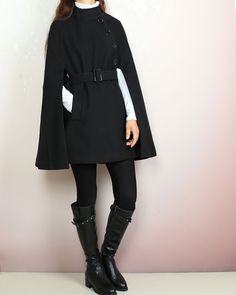 * A cool and long woolen cape coat, very elegant. * With black buttons and fully lined with lining. * Material: 50% wool, 50% polyester. Shop sizing chart FYI ( actual body figures, not laying flat clothes measurements) Size XS (US 2, UK 6, German 32, French 34) Bust: fits bust around 33.5 inches/85cm Waist: fits waist around 26 inches/66cm Hips: fits hips around 36 inches/91cm Size S (US 6, UK 10, German 36, French 38) Bust: fits bust around 35.5 inches/90cm Waist: fits waist around 28 inches/7 Black Wool Poncho For Winter, Chic Winter Wool Cape Coat, Chic Winter Cape For Workwear, Chic Winter Workwear Cape, Elegant Wool Cape For Fall, Elegant Long Coat Cape For Winter, Chic Fall Cape Wool Coat, Fall Wool Cape Coat For Work, Black Wool Poncho For Fall